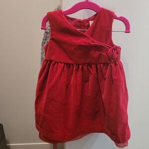 Red Sleeveless Dress with Floral Accent